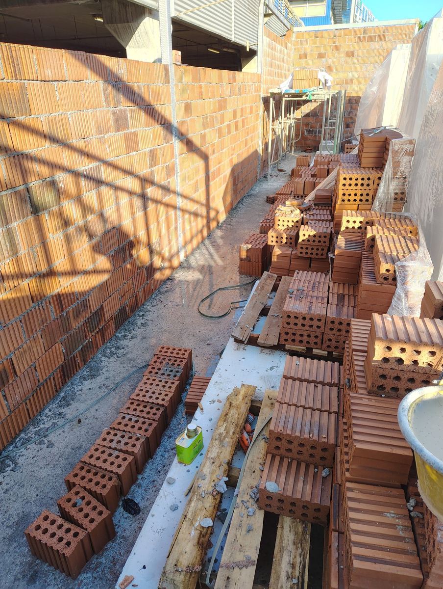 Erecting walls on new foundation